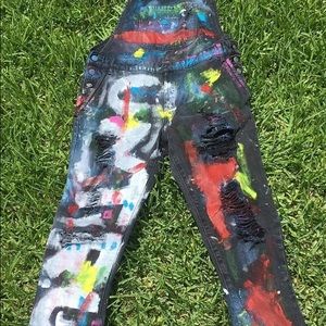 “Untrust” handmade overalls.